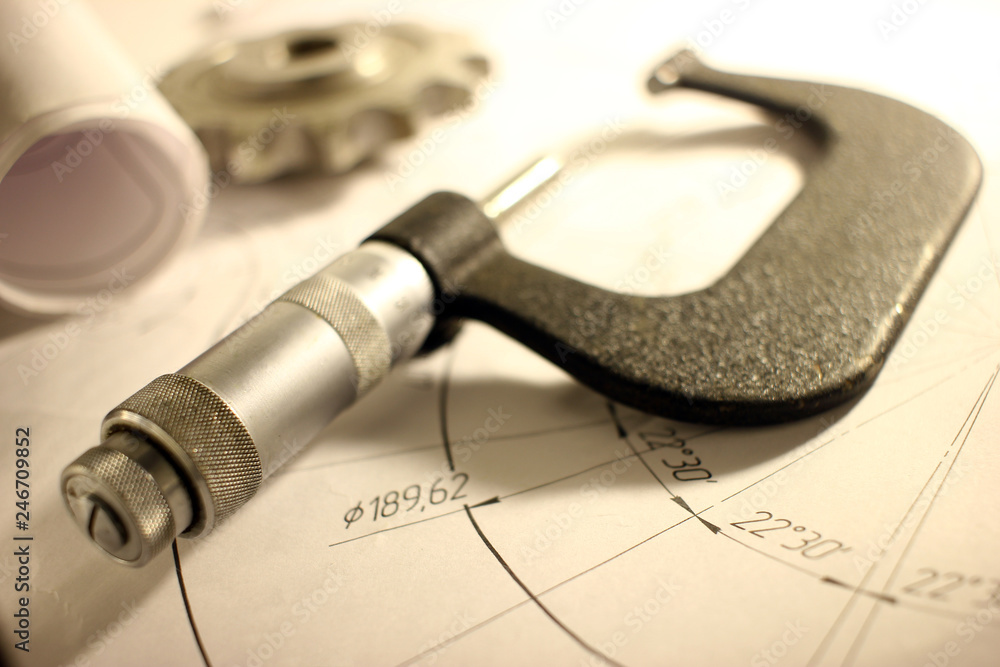 details after processing lies on the technical drawing, ready to work with the drawing in mechanical engineering, vignette details after processing lies on the technical drawing, ready to work with the drawing in mechanical engineering, vignette