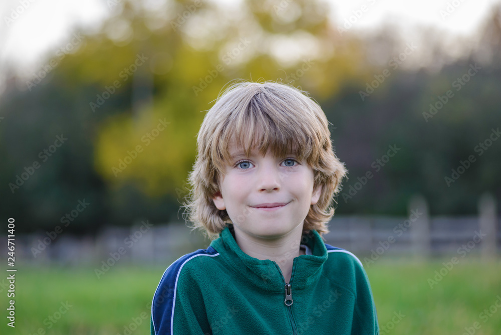 Portrait of a smiling boy with a blurred background Portrait of a smiling boy with a blurred background