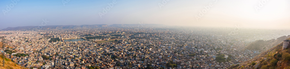 Panoramic beautiful sunset view from Nahargarh Fort stands on the edge of the Aravalli Hills, overlooking the city of Jaipur in the Indian state of Rajasthan, India.
