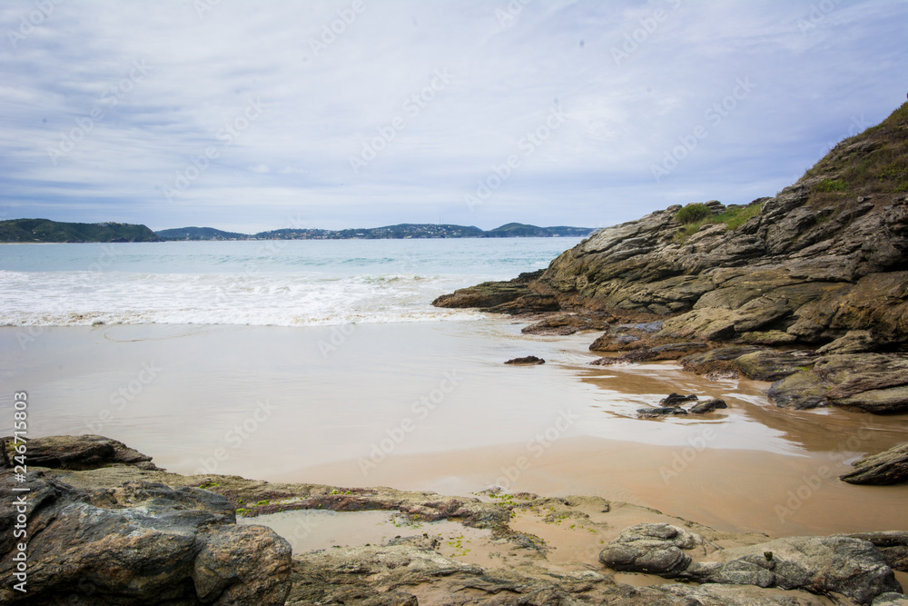 Tucun beach, Búzios, Rio de Janeiro, Brazil, beautiful landscape with some rocks on the beach Tucun beach, Búzios, Rio de Janeiro, Brazil, beautiful landscape with some rocks on the beach