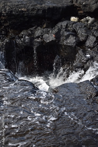 Water filling a crevice in the the lava field