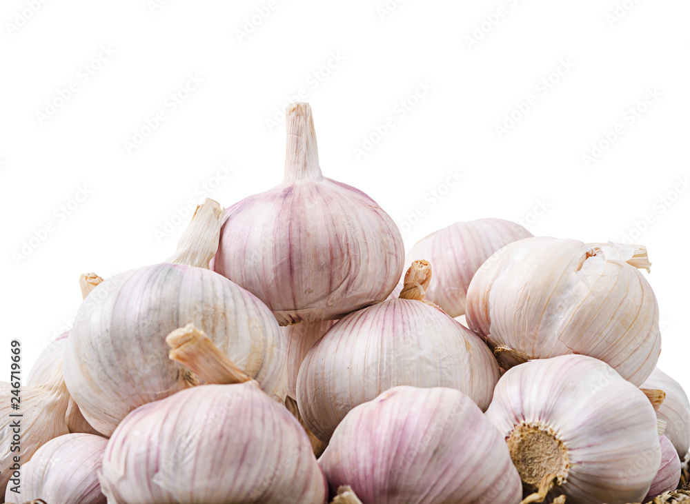 Fototapeta premium Heap of raw garlic isolated on white background.