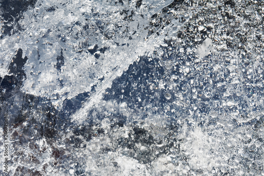 The texture of the ice. The frozen water.Winter background The texture of the ice. The frozen water.Winter background