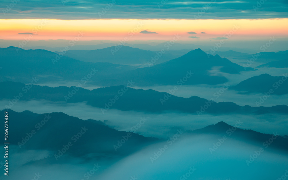 Beautiful mountains and sea of fog in the early morning of Northern Thailand. Natural background.