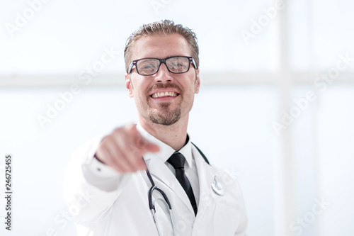 confident doctor therapist pointing finger at you