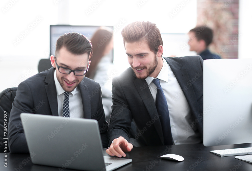 Businessman explaining his offer to business partner Businessman explaining his offer to business partner