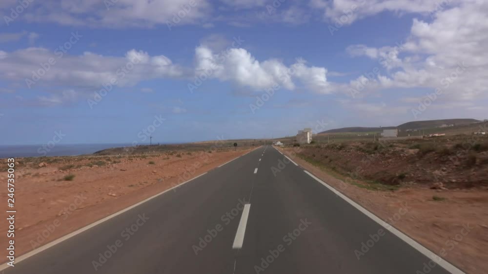 View from a car driving on the road along the Atlantic coast, Morocco, Africa, 4k View from a car driving on the road along the Atlantic coast, Morocco, Africa, 4k