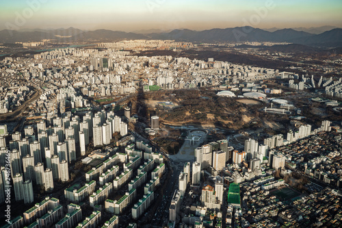 Aerial view cityscape of Seoul, South Korea. Aerial View Lotte tower at Jamsil. View of Seoul with river and mountain. Seoul downtown city skyline, Aerial view of Seoul
