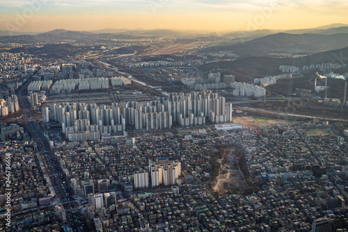 Aerial view cityscape of Seoul, South Korea. Aerial View Lotte tower at Jamsil. View of Seoul with river and mountain. Seoul downtown city skyline, Aerial view of Seoul © suvorovalex