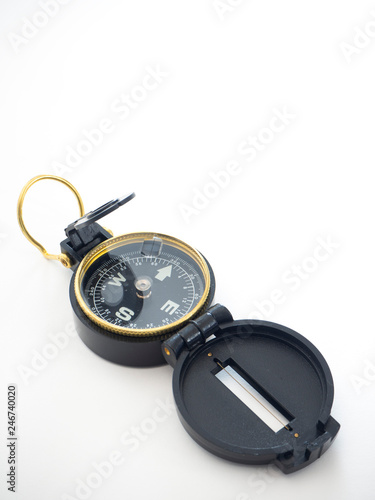 Military black compass isolated on white