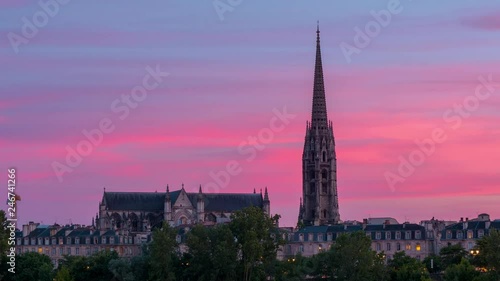 Amazing timelapse video of Bordeaux skyline at sunset time, view to the Basilica of Saint Michel (Basilique Saint-Michel), France.