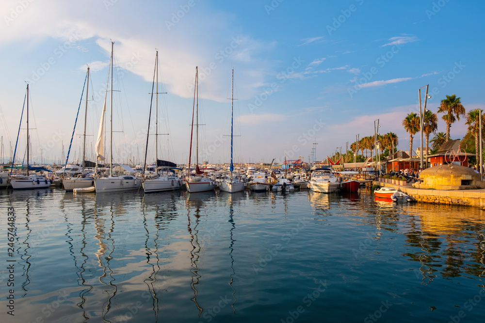 Alghero, Sardinia, Italy - Summer skyline over the Alghero Marina yacht port at the Gulf of Alghero at Mediterranean Sea
