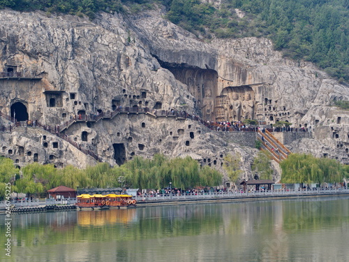 Luoyang Longmen grottoes. Broken Buddha and the stone caves and sculptures in the Longmen Grottoes in Luoyang, China. Taken in 14th October 2018