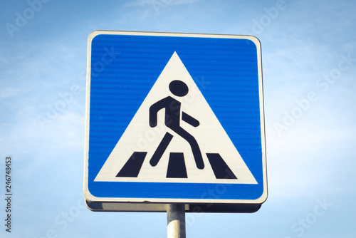Pedestrian crossing sign in blue and white. Zebra crossing sign. Passengers' crossing.