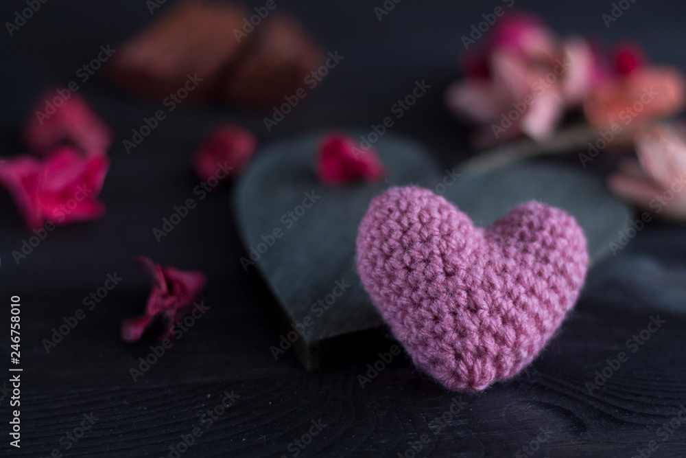 Obraz premium Two hearts on dark background