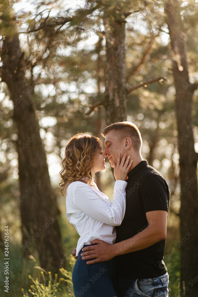 Portrait of a happy young couple enjoying a day in the park together