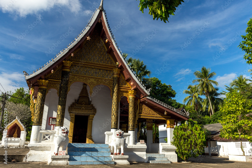 Fototapeta premium Luang Prabang, Laos – December 14, 2018: Beautiful buddhist temple in Luang Prabang old town, former capital of Laos and now a UNESCO World Heritage city.