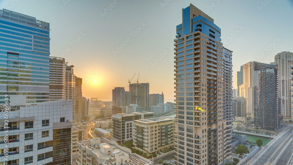 Aerial view of Dubai Marina from a vantage point at sunset timelapse.