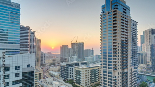 Aerial view of Dubai Marina from a vantage point at sunset timelapse.