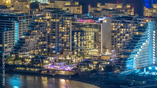 Aerial view of Palm Jumeirah Island night timelapse.