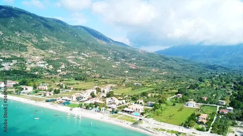 Aerial drone video of iconic seaside village and port of Vasiliki famous for trips to Ionian islands and nearby beaches, Lefkada island, Ionian, Greece Aerial drone video of iconic seaside village and port of Vasiliki famous for trips to Ionian islands and nearby beaches, Lefkada island, Ionian, Greece