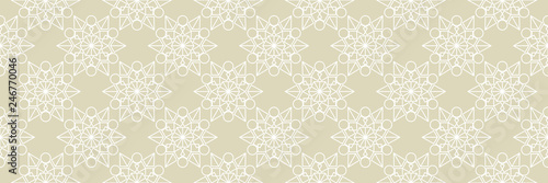 Geometric seamless pattern. White design on long olive green background