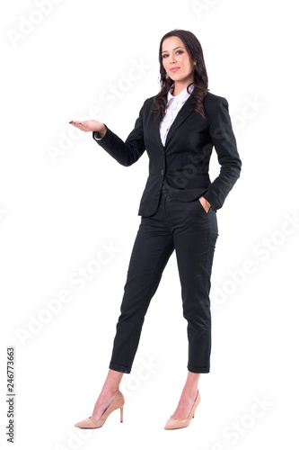 Confident business woman marketing and advertising with open hand gesture. Full body isolated on white background. 