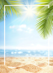 Summer background with frame, nature of tropical golden beach with rays of sun light and leaf palm. Golden sand beach close-up, sea,  blue sky, white clouds. Copy space, summer vacation concept.