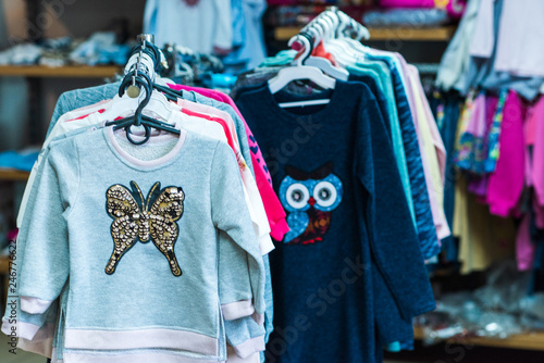 Children's clothing store, sale time, fashion concept for kids and other things © T.Den_Team