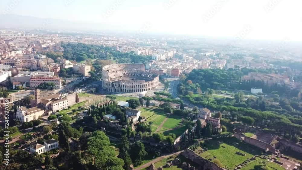 Aerial drone view video of iconic ancient Arena of Colosseum, also known as the Flavian amphitheatre in the heart of Rome next to Roman Forum, Italy Aerial drone view video of iconic ancient Arena of Colosseum, also known as the Flavian amphitheatre in the heart of Rome next to Roman Forum, Italy