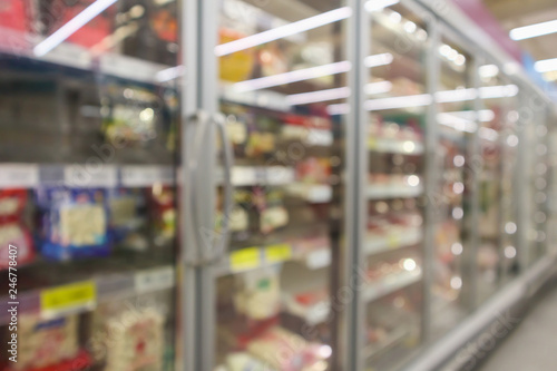 Photography supermarket commercial refrigerators freezer showing frozen foods abstract blur