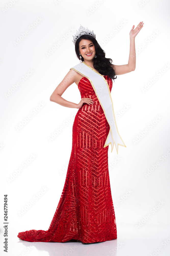 Portrait of Miss Pageant Contest in Asian Red Sequin Evening Ball Gown dress with Silver Diamond Crown Sash, fashion make up face hair style, studio lighting white background isolated copy space Portrait of Miss Pageant Contest in Asian Red Sequin Evening Ball Gown dress with Silver Diamond Crown Sash, fashion make up face hair style, studio lighting white background isolated copy space