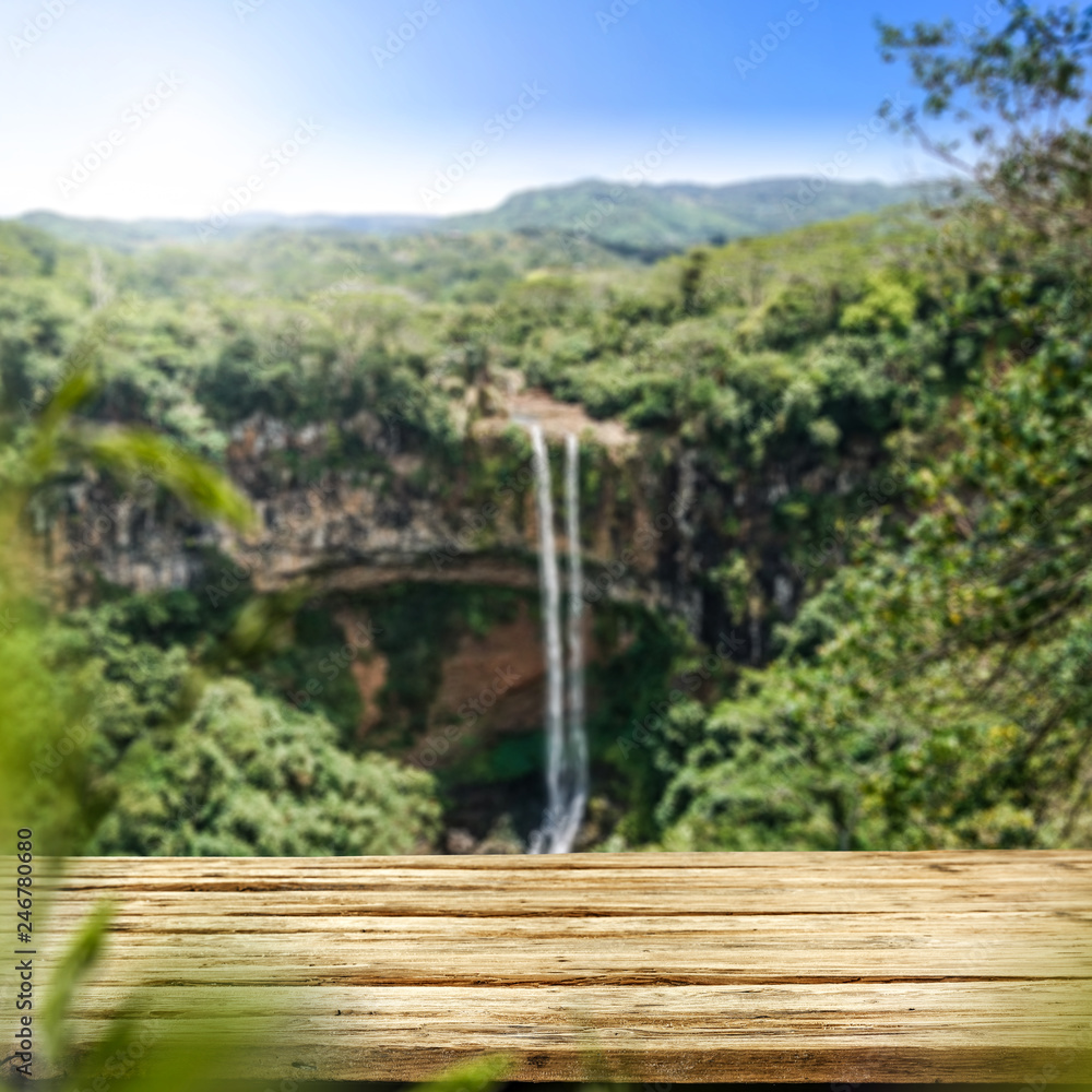 Fototapeta premium Table background of free space and big waterfall 