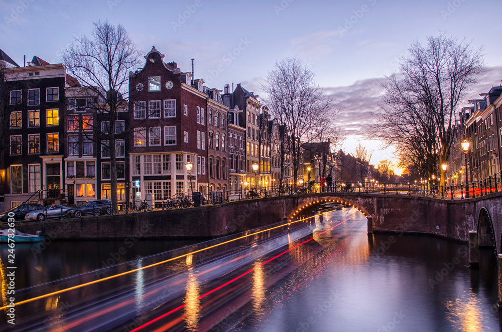 Light Trails in Amsterdam Canal at Sunset