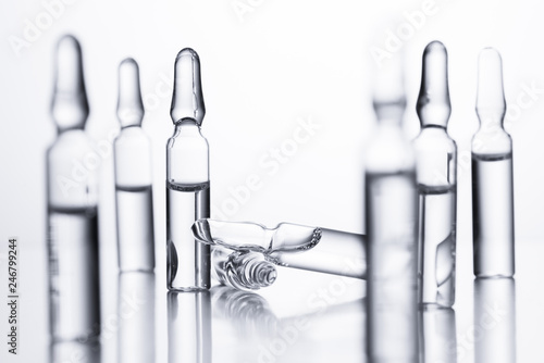 Medical ampules for injections on a white background. photo