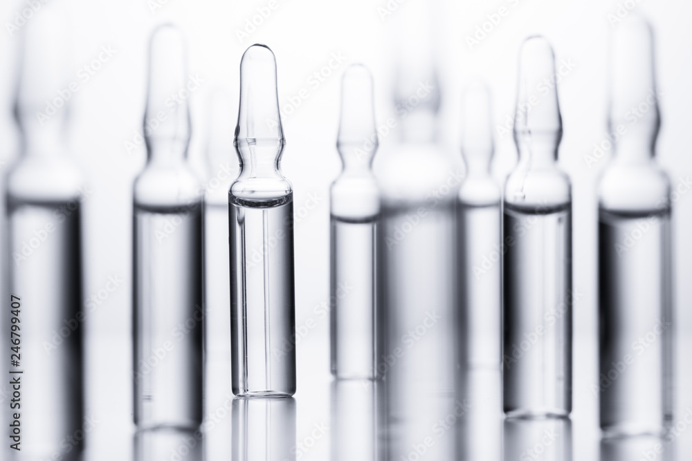 Medical ampules for injections on a white background. Medical ampules for injections on a white background.