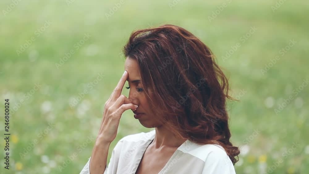 beautiful mixed race woman doing yoga and relaxation exercises in park beautiful mixed race woman doing yoga and relaxation exercises in park