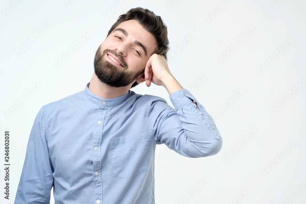 Young handsome business man with happy face smiling and looking at the camera. Young handsome business man with happy face smiling and looking at the camera.