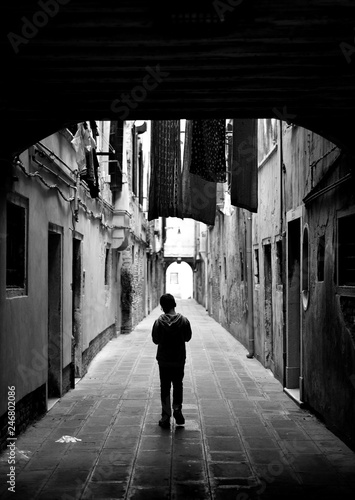 Young boy on a calle in Venice