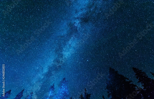 Bright night starry sky with millions of stars and galaxy Milky Way.