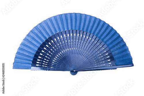 Open dark blue fan on white isolated background.