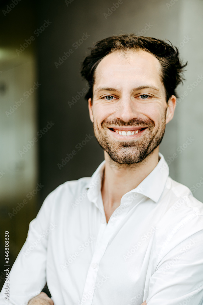 portrait of happily smiling caucasian businessman portrait of happily smiling caucasian businessman