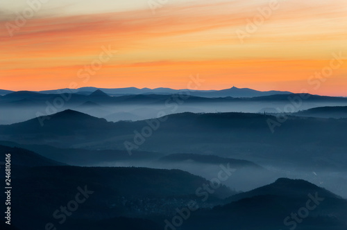 Fototapeta Naklejka Na Ścianę i Meble -  Dramatic sunrise over beautiful mountain peaks. Decinsky Sneznik, Czech republic