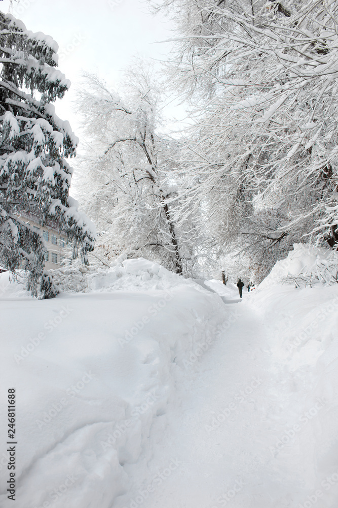snowy harsh winter in the city of Saratov, ice drifts in the street, Russian extreme snowy harsh winter in the city of Saratov, ice drifts in the street, Russian extreme