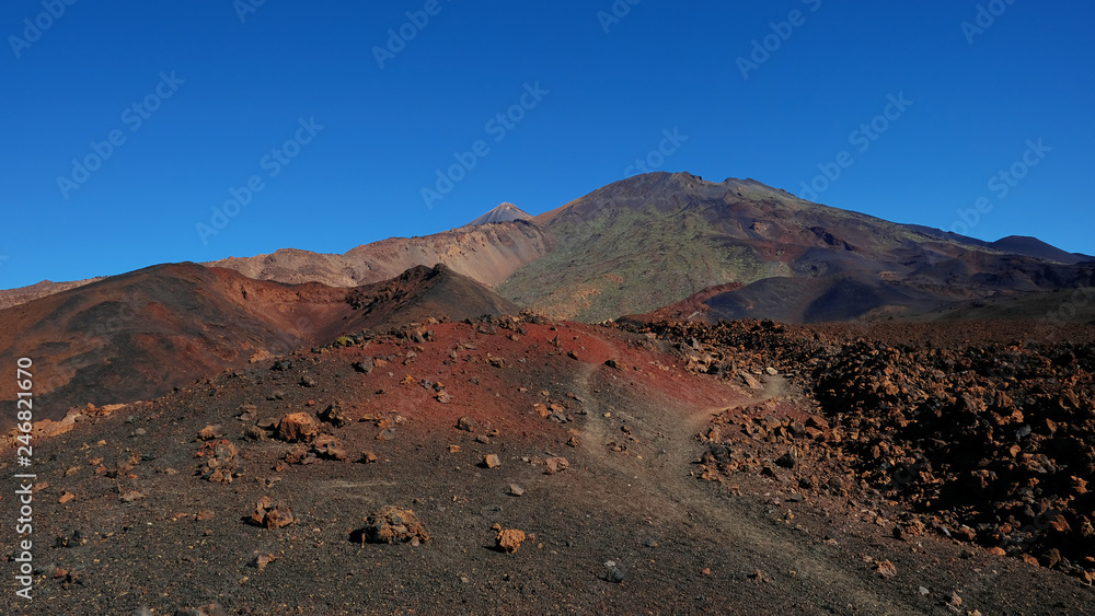 Volcanic landscape with lava Aa at Montana Samara hike, one of the most unusual alien-like environment found at Teide National Park, with views towards Pico del Teide, Pico Viejo and Las Cuevas Negras