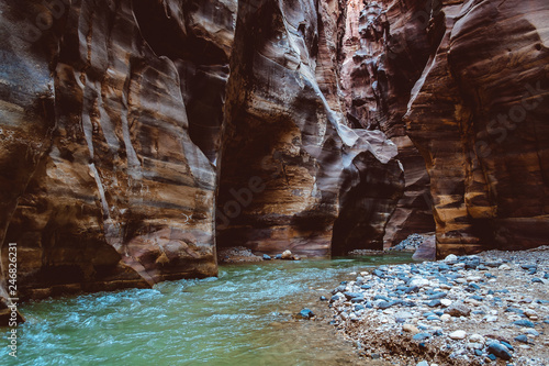 River canyon of Wadi Mujib in amazing golden light colors. Wadi Mujib is located in area of Dead Sea in Jordan