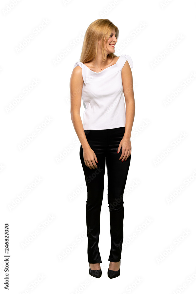 Young blonde woman smiling over isolated white background Young blonde woman smiling over isolated white background