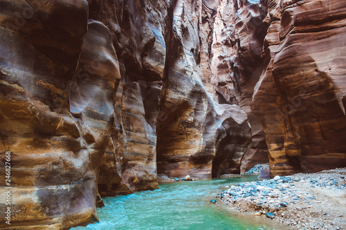 River canyon of Wadi Mujib in amazing golden light colors. Wadi Mujib is located in area of Dead Sea in Jordan photo