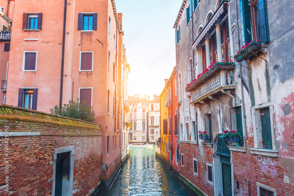 Narrow canal in Venice overlooks the Grand Canal.