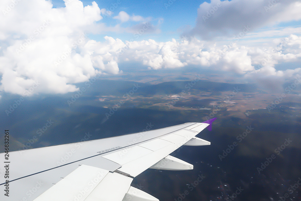 Dramatic atmosphere panorama view of beautiful blue sky and soft white clouds from aircraft. Dramatic atmosphere panorama view of beautiful blue sky and soft white clouds from aircraft.